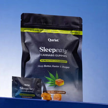 Load image into Gallery viewer, Two Qurist Sleepeasy Cannabis Gummies packages, with one large and one small pouch, set against a blue background.
