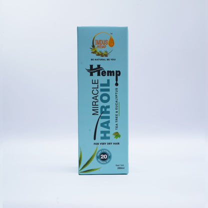 Box of Hemp Hair Oil on a light blue background