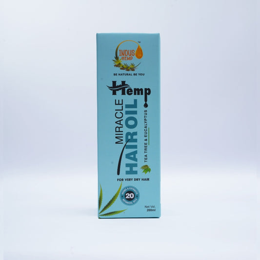 Box of Hemp Hair Oil on a light blue background
