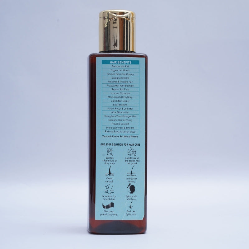 Hemp Hair Oil bottle with gold cap and blue label on a light gray background