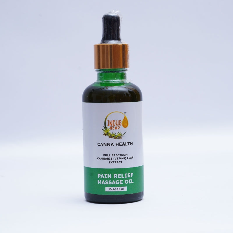 Bottle of Cannabis Pain Relief Massage Oil on a light gray background