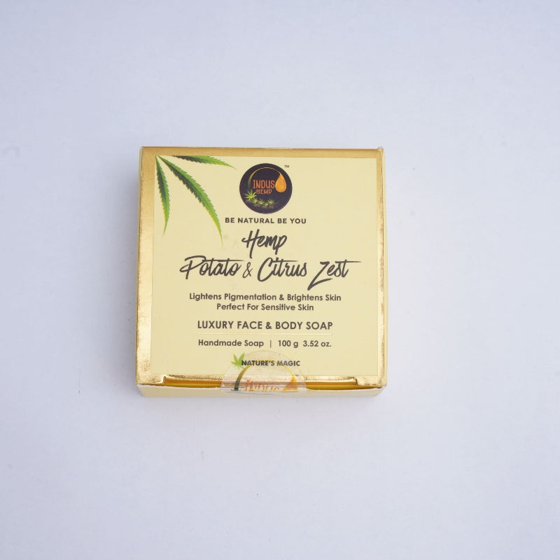 Gold Hemp soap packaging with text and branding on a light gray background