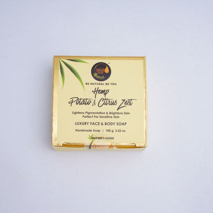 Gold Hemp soap packaging with text and branding on a light gray background