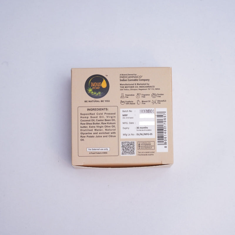 Cardboard box with branding and text on a light gray background