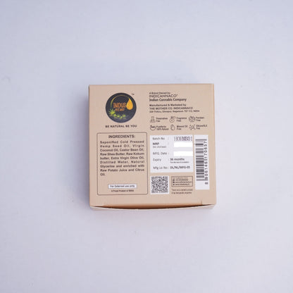 Cardboard box with branding and text on a light gray background