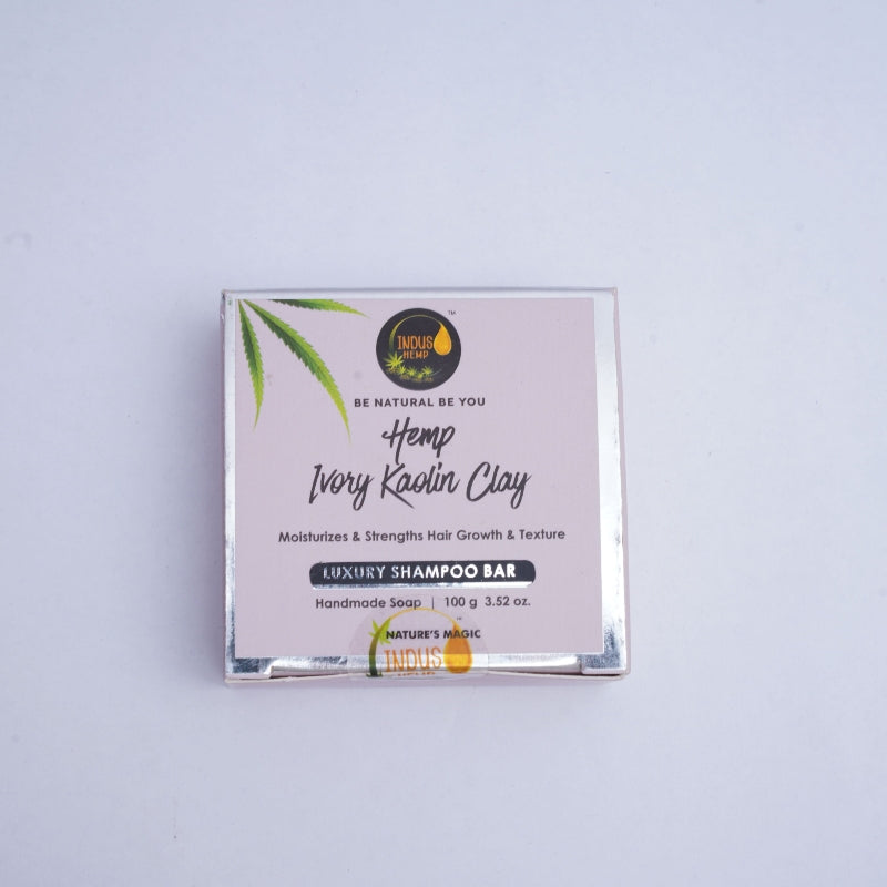 Luxury Hemp shampoo bar packaging with brand logo and text on a light gray background