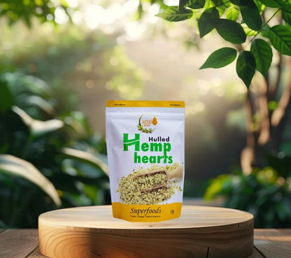 Packaging of hulled hemp hearts on a wooden surface with a natural background