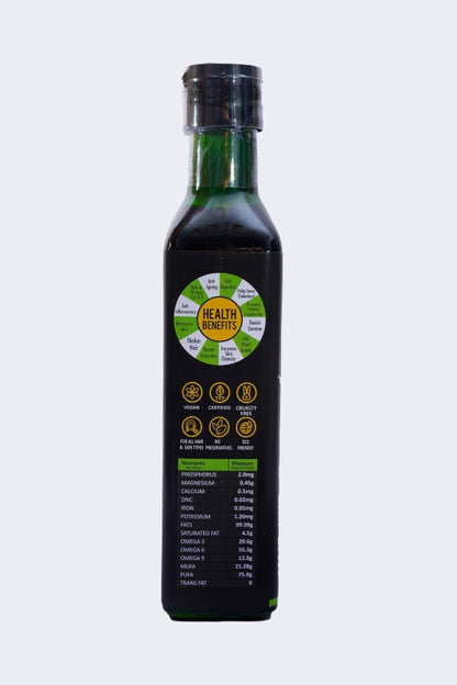 Bottle of hemp seed oil with a label on a white background