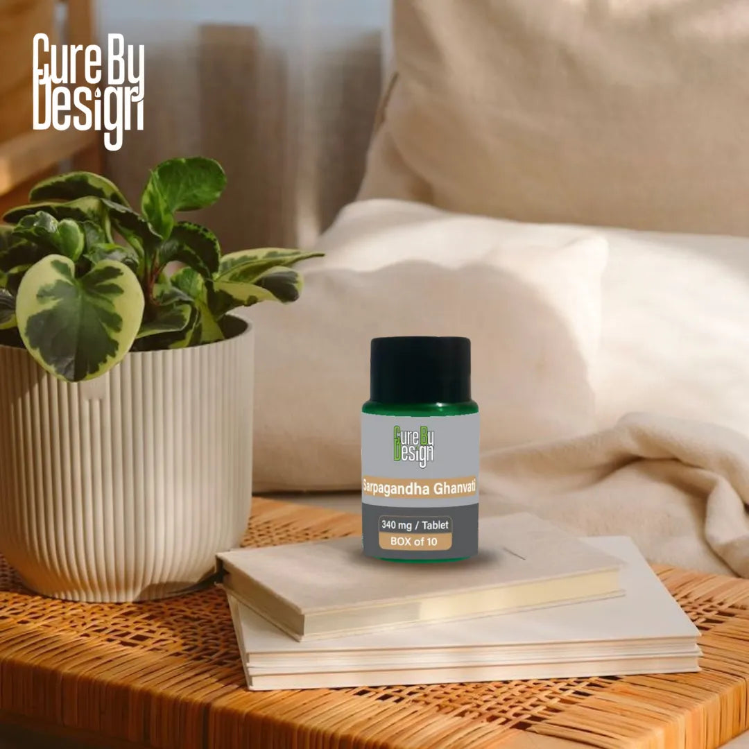 Cure By Design supplement bottle on a table with a plant and notebook in a home setting
