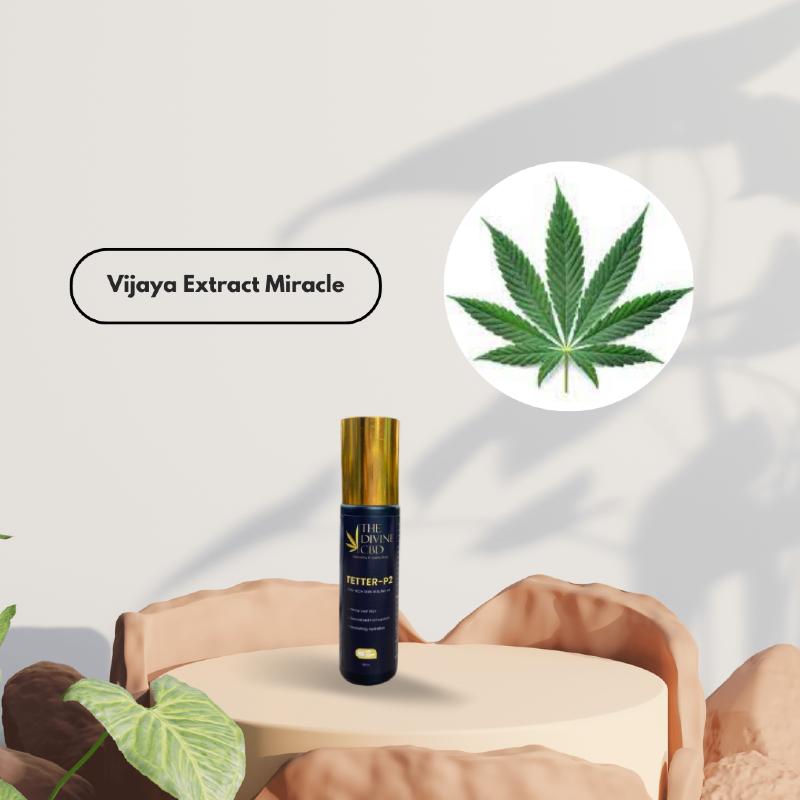 Promotional display featuring a cannabis leaf and a product bottle DIVINE CBD with a golden cap on a round pedestal.