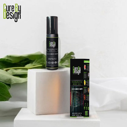 Cure by Design hemp seed oil bottle and packaging on a white background with green leaves.