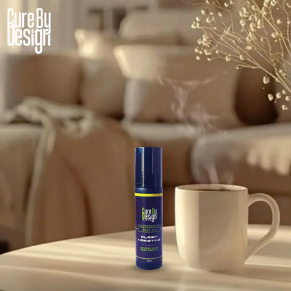 Cure By Design Therapeutic Healing Roll-on - Sleep Assisting product on a table with a blurred background