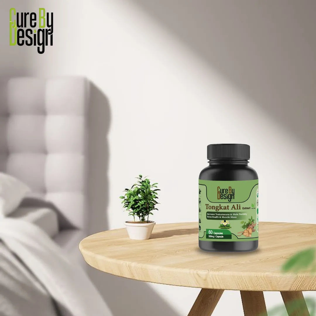 Bottle of Cure By Design Tongkat Ali on a wooden table with a blurred background