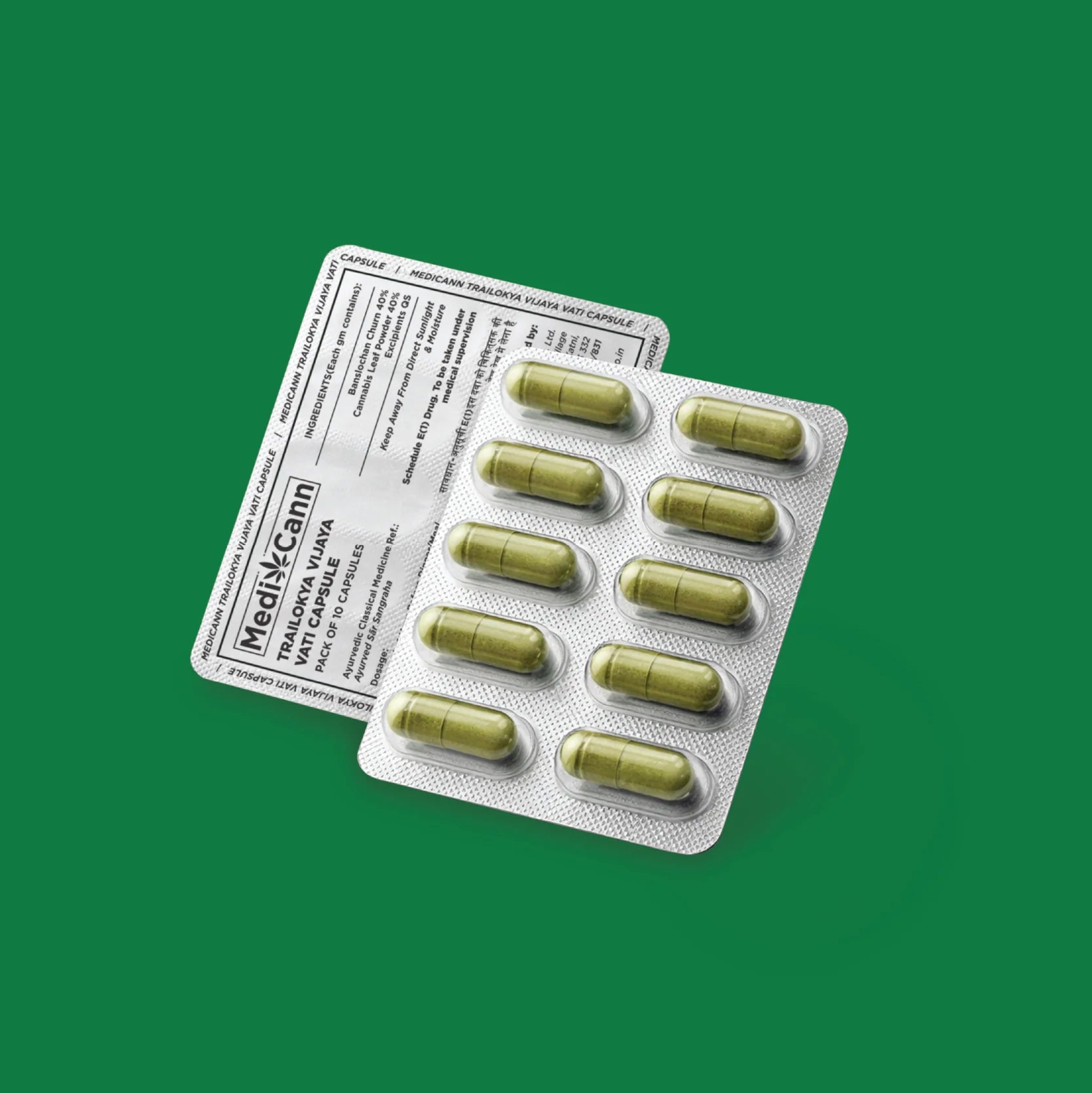 Blister pack of green Trailokya Vijaya Vati capsules with a label on a green background