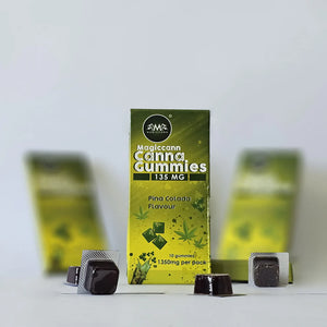 Box of Magiccann Cannabis Gummies with dark gummies in blister packs.