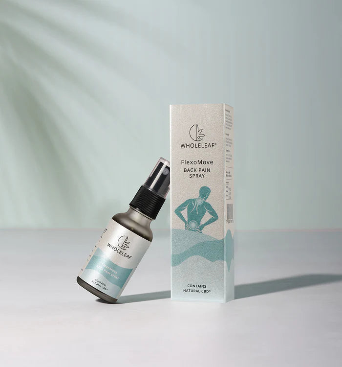 Wholeleaf FlexaMove Back Pain Spray bottle and packaging on a light gray background