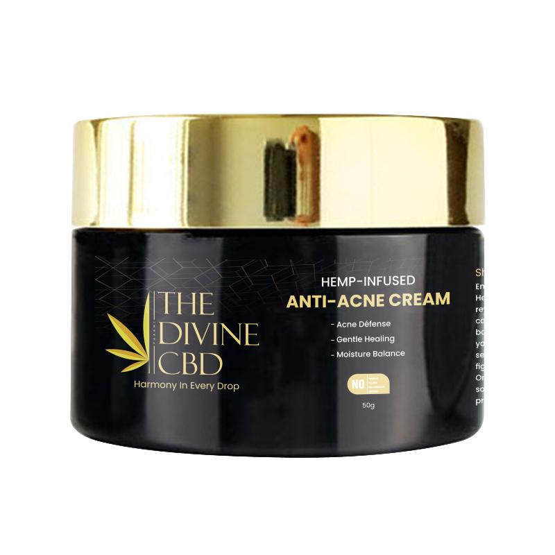 Jar of "THE DIVINE CBD Hemp-Infused Anti-Acne Cream" with a gold lid and black body.

