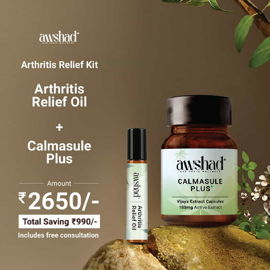 a bottle of cannabis oil and capsules next to a rock