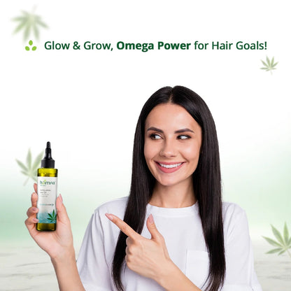 Woman with long hair holding a bottle of 'Glow & Grow' product with text 'Omega Power for Hair Goals!' on a light green background.