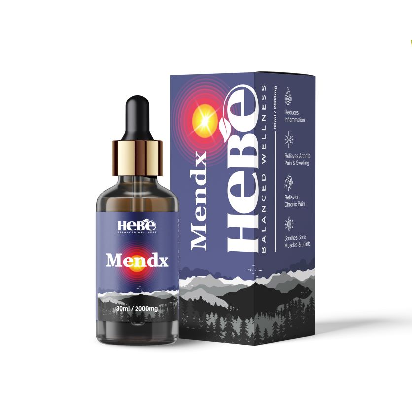 CBD oil bottle with a gold cap in front of its blue and black packaging box featuring mountain graphics and the brand "HEBE."


