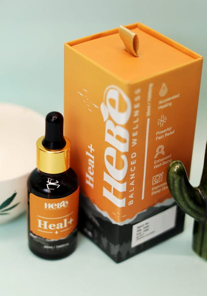 Hebe Wellness CBD oil bottle and packaging with an orange design.

