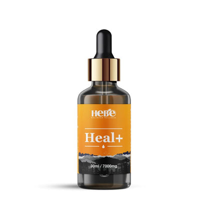 A bottle of Hebe Wellness Heal+ CBD oil with an orange label.