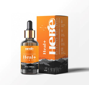Hebe Wellness Heal+ CBD Oil bottle and box with orange and black mountain design.